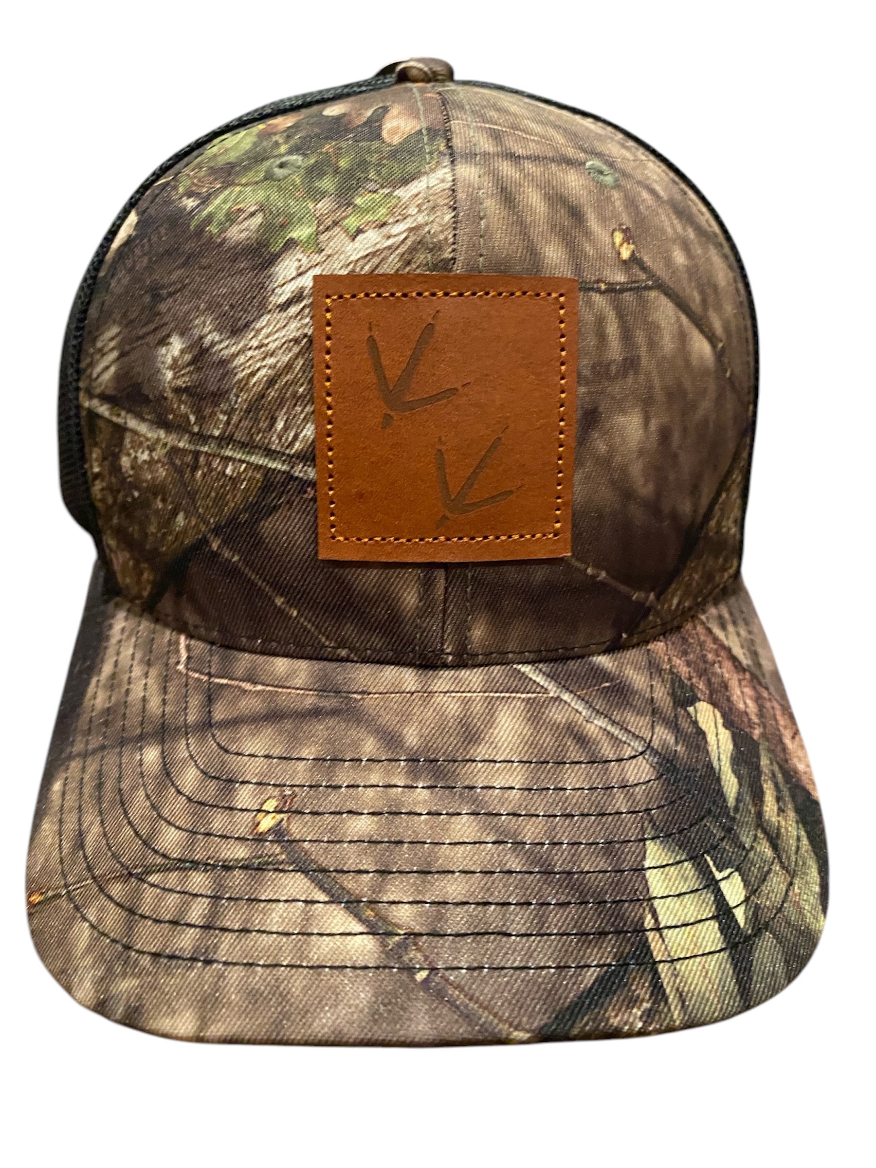 Leather Patch Turkey Tracks Trucker Hat in Mossy Oak Camo
