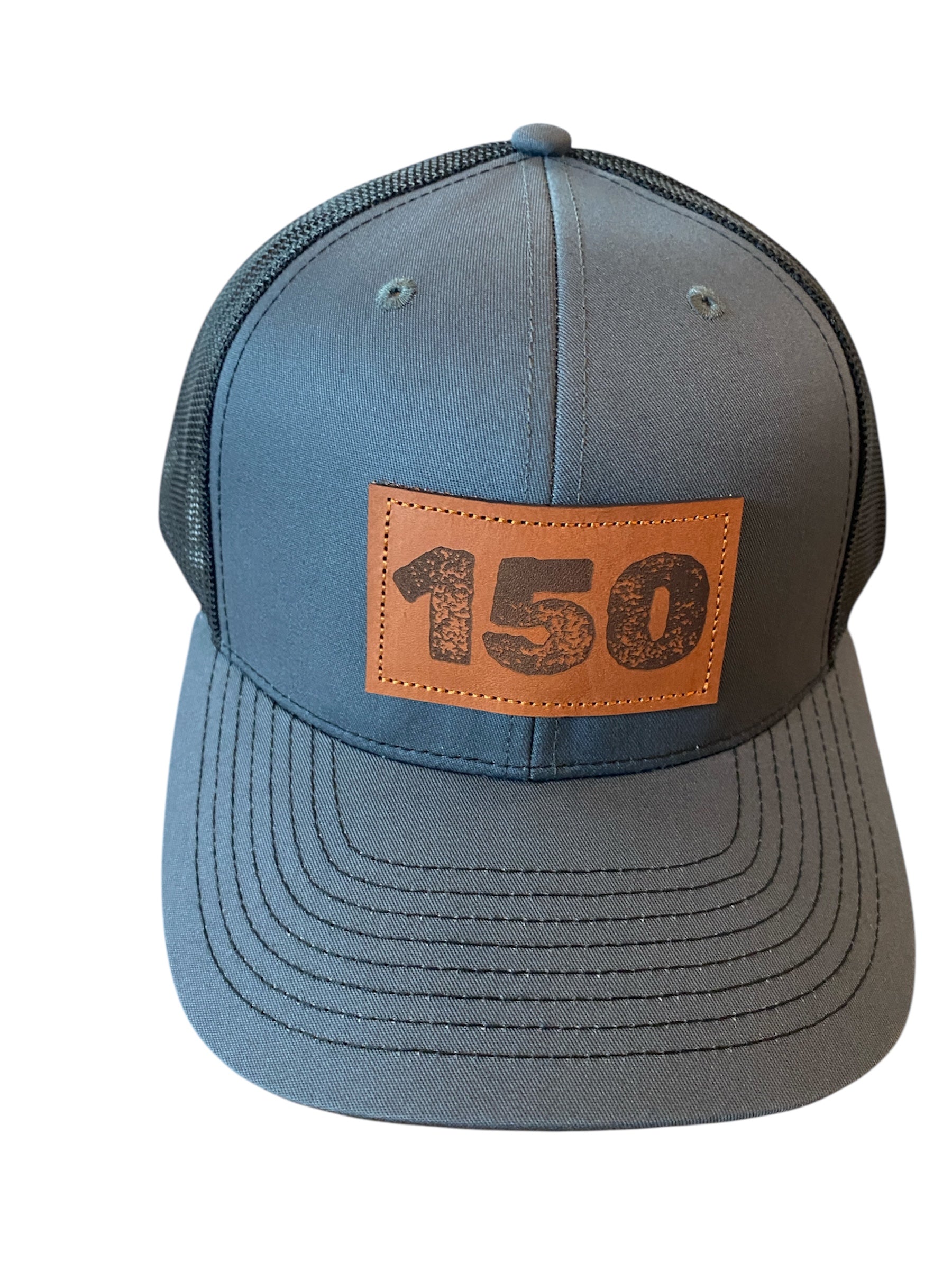 Richardson Leather Patch 150 trucker hat in charcoal and black mesh