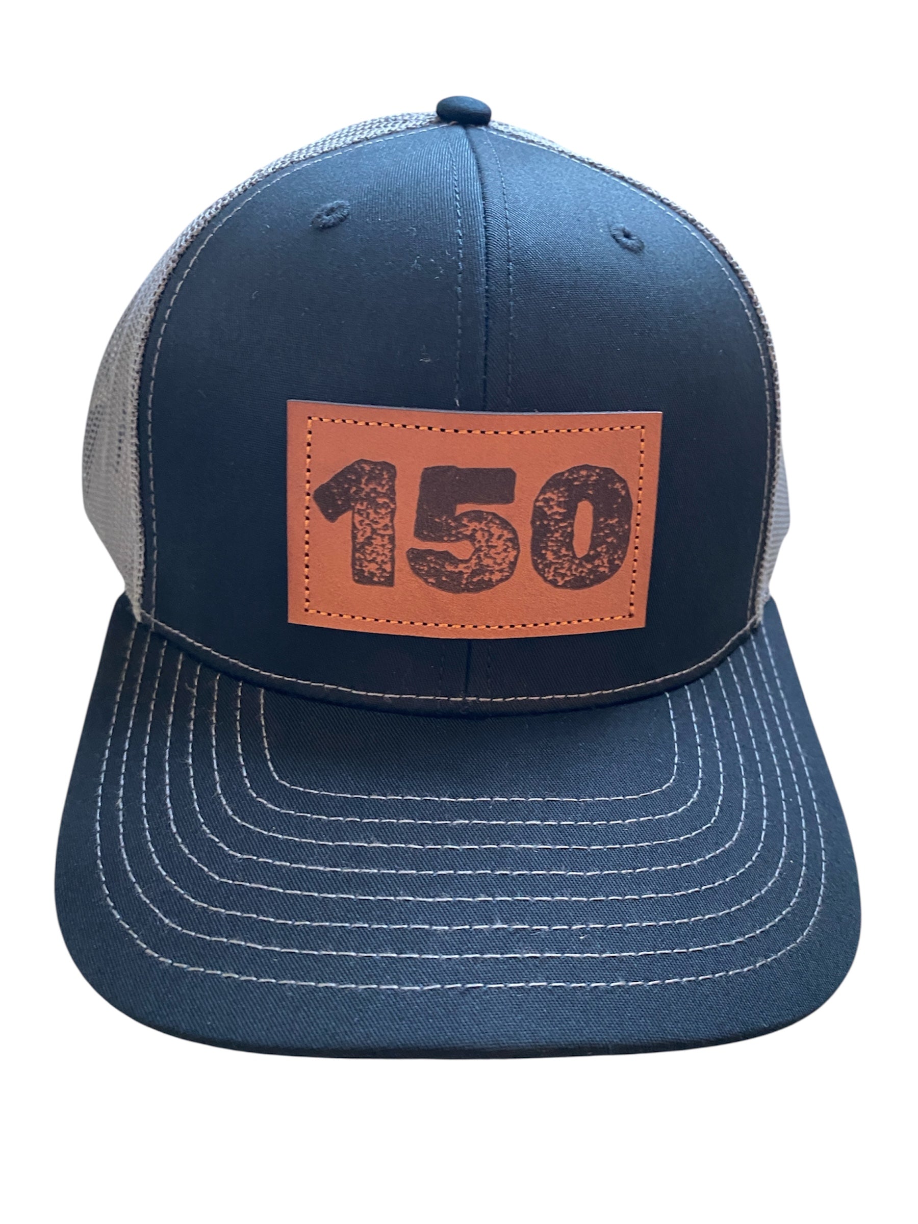 Richardson Leather Patch 150 trucker hat in black with gray mesh