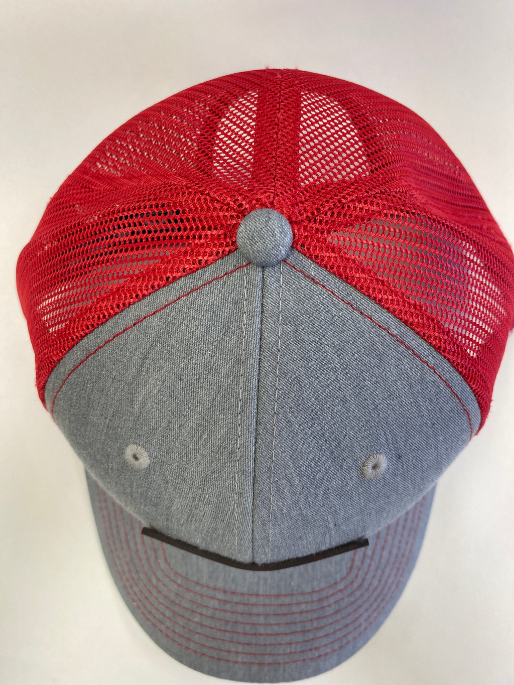 Leather Patch NORTH Trucker Hat in heather gray/red mesh