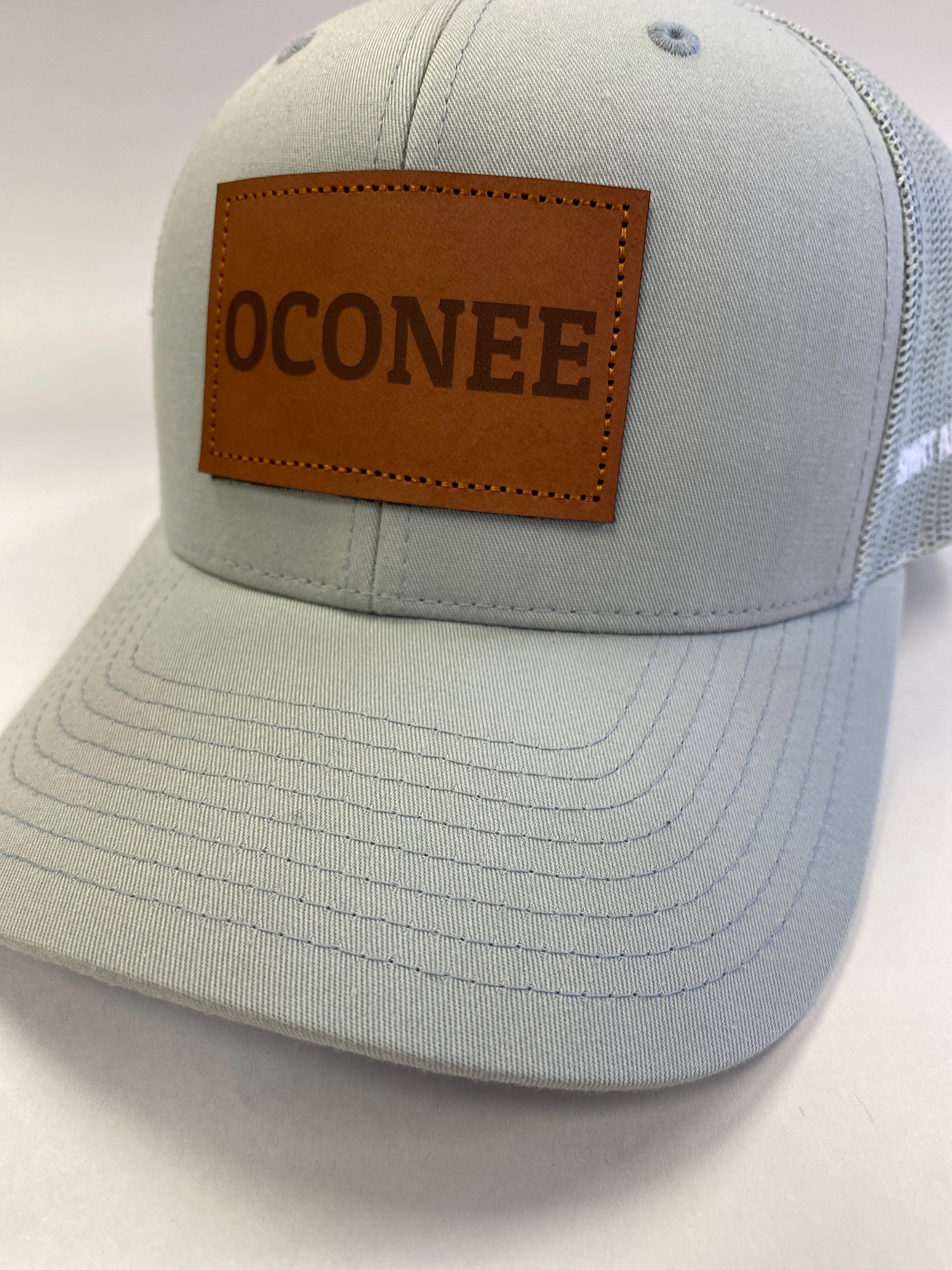 Leather Patch OCONEE Trucker Hat in a subtle gray