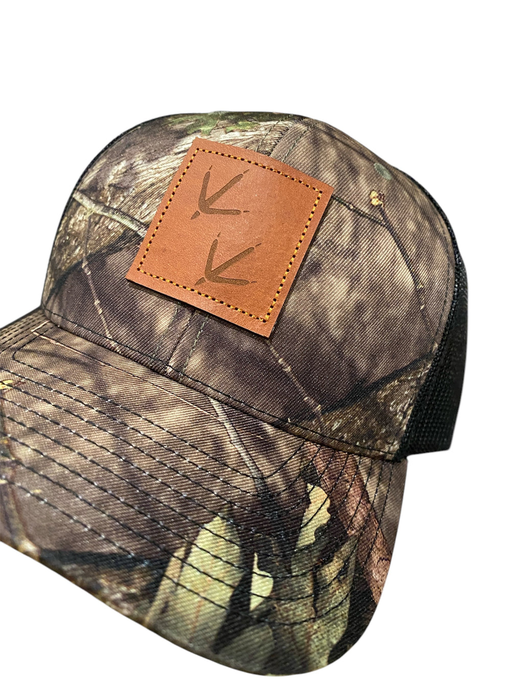 Leather Patch Turkey Tracks Trucker Hat in Mossy Oak Camo