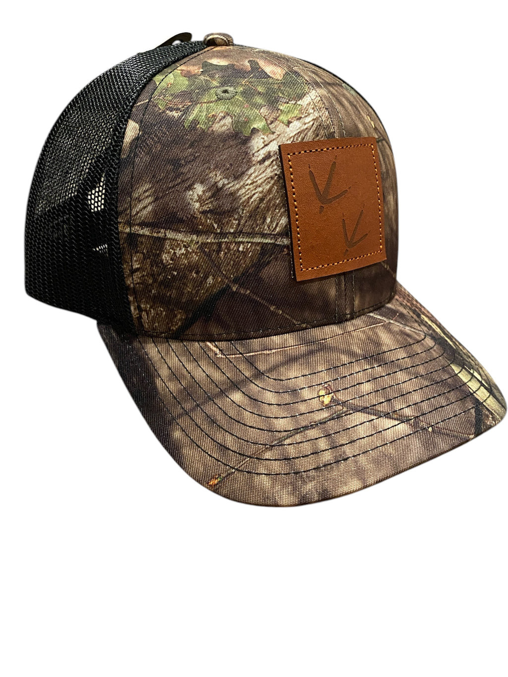 Leather Patch Turkey Tracks Trucker Hat in Mossy Oak Camo